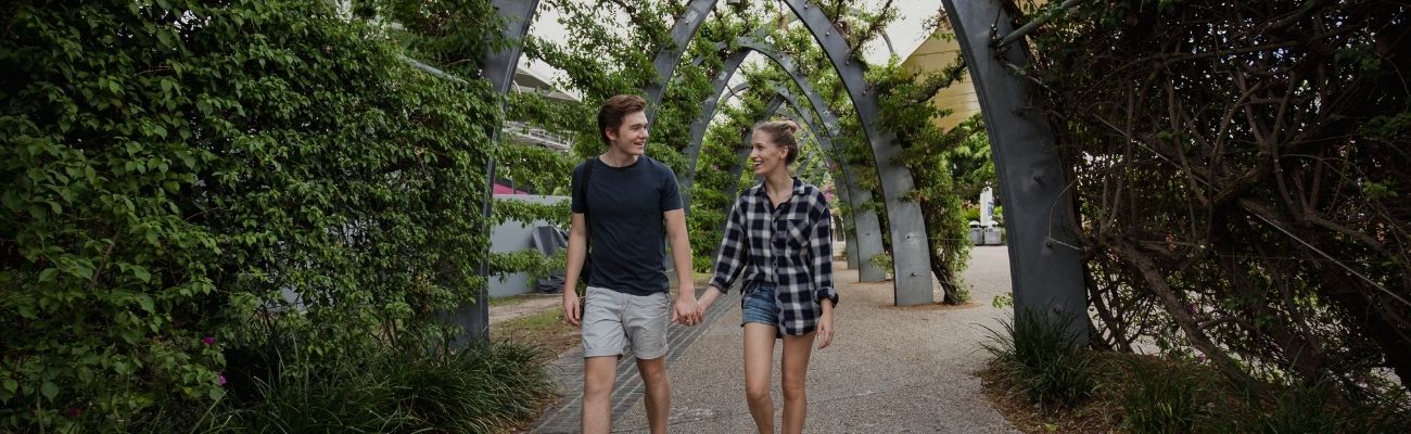 Couple holding hands in Brisbane