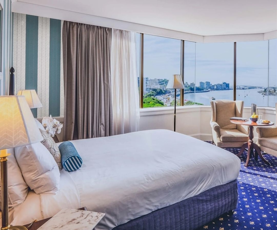 Lovely hotel room with big windows overlooking Brisbane