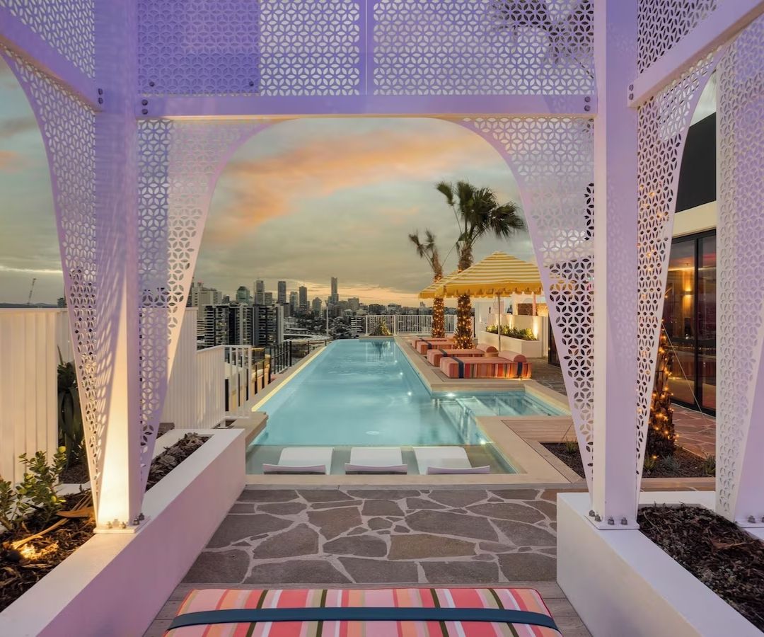 Beautiful hotel pool at sunset