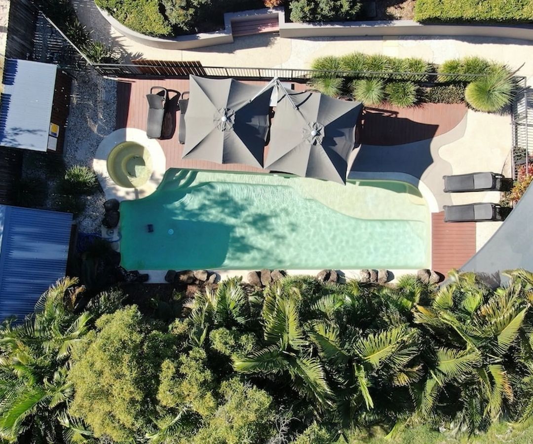 Aerial view of pool and hotel