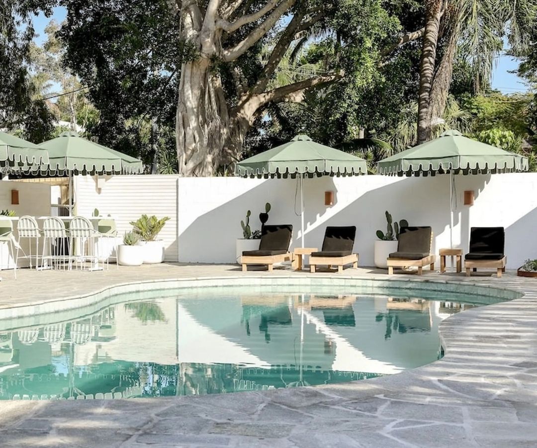 Lovely pool with deckchairs