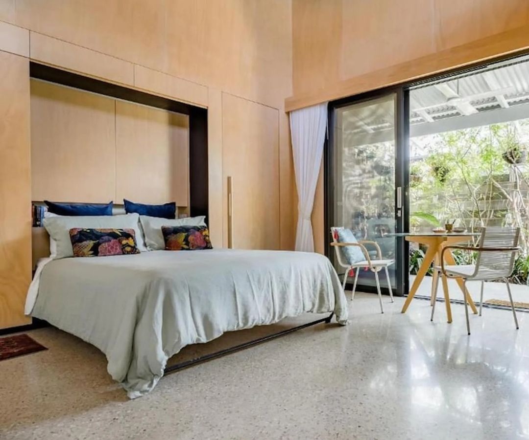 Large hotel room with balcony