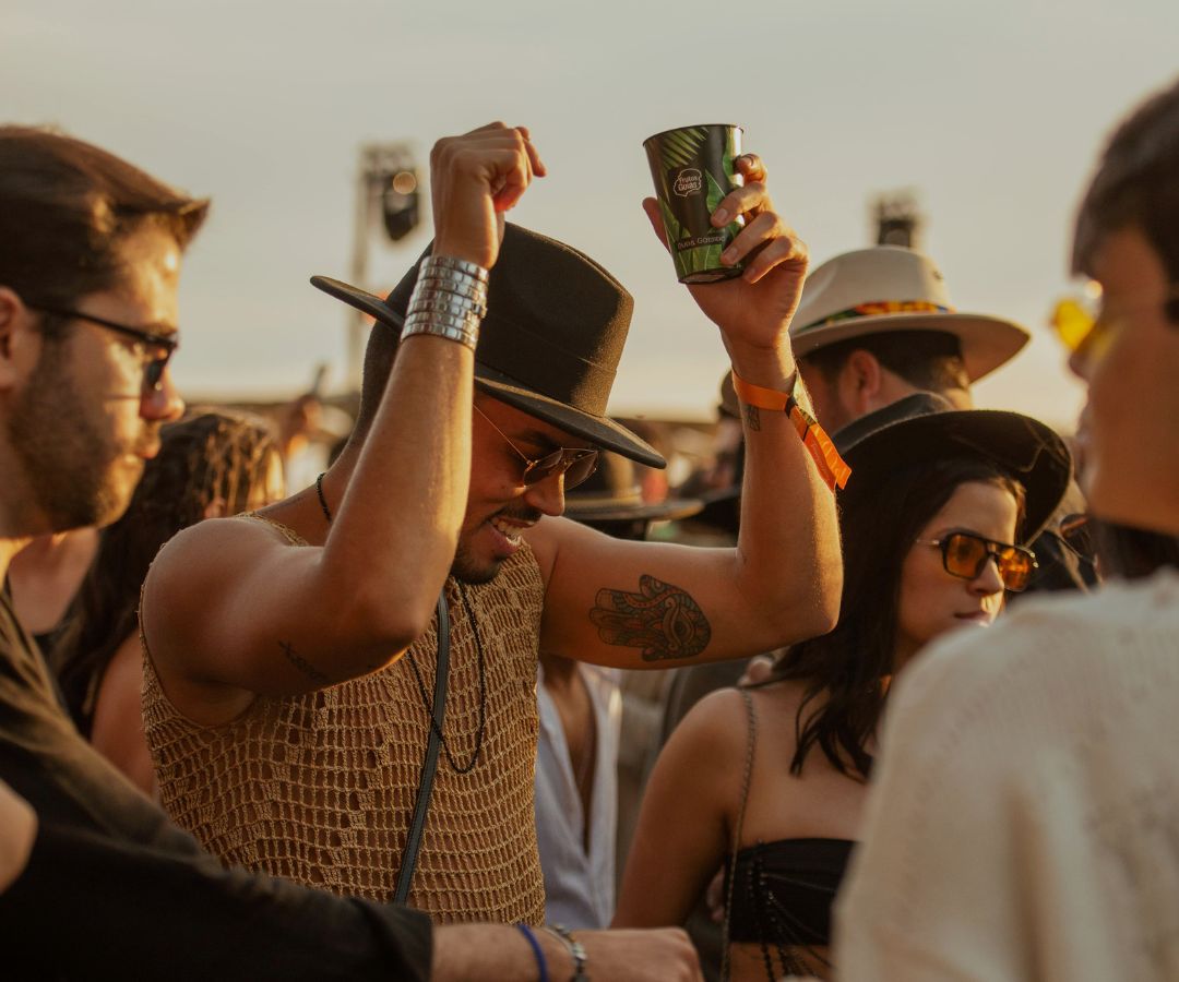 Happy festival goer dancing