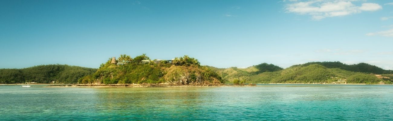 Tropical island surrounded by the ocean