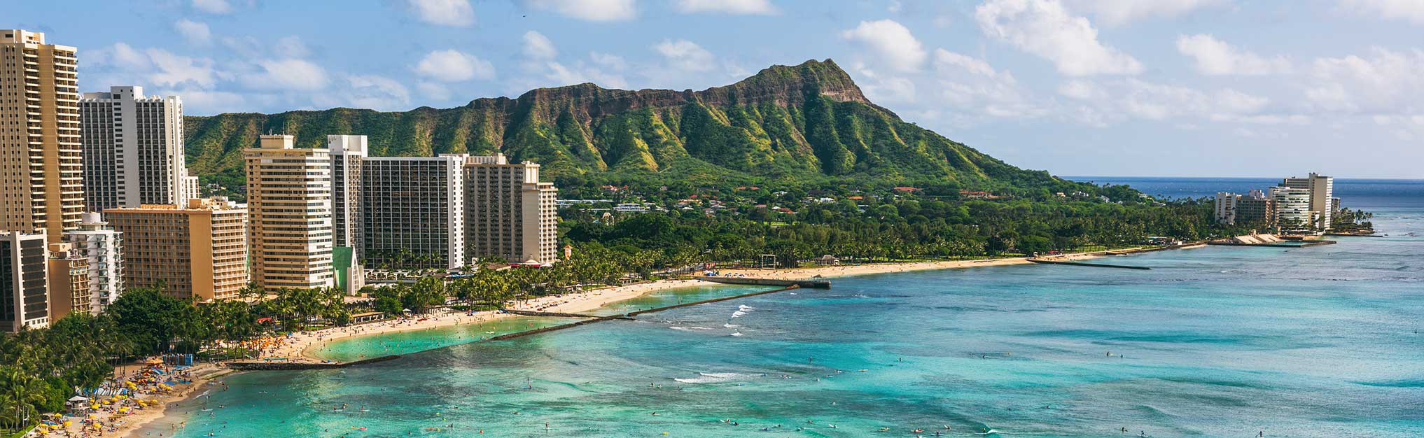 Hawaii beach Honolulu city travel landscape of Waikiki beach and Diamond Head mountain peak at sunset