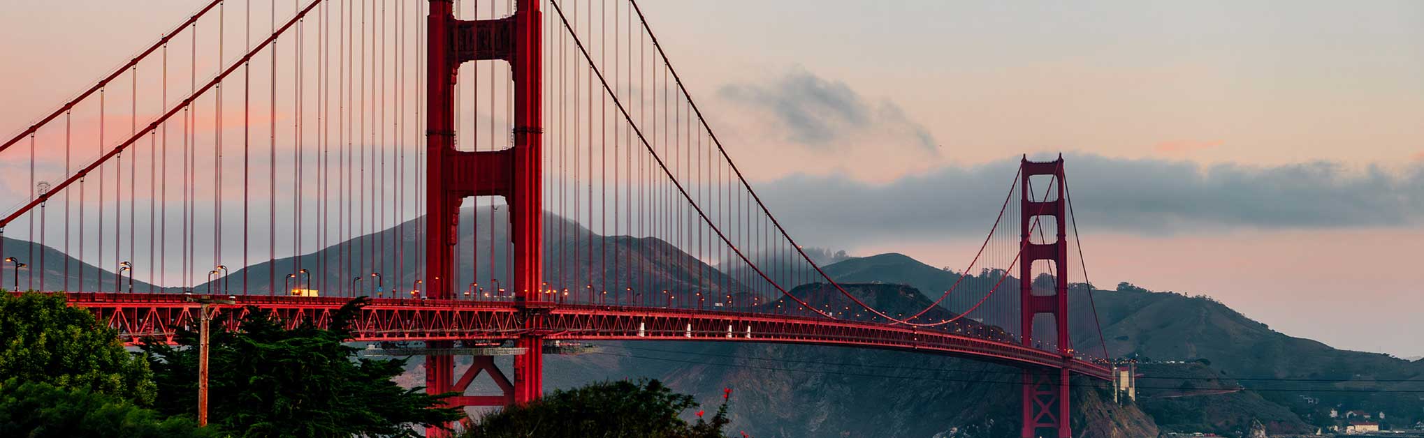 Golden Gate Bridge at Twilight: Iconic San Francisco Landmark Bathed in Serene Evening Colors