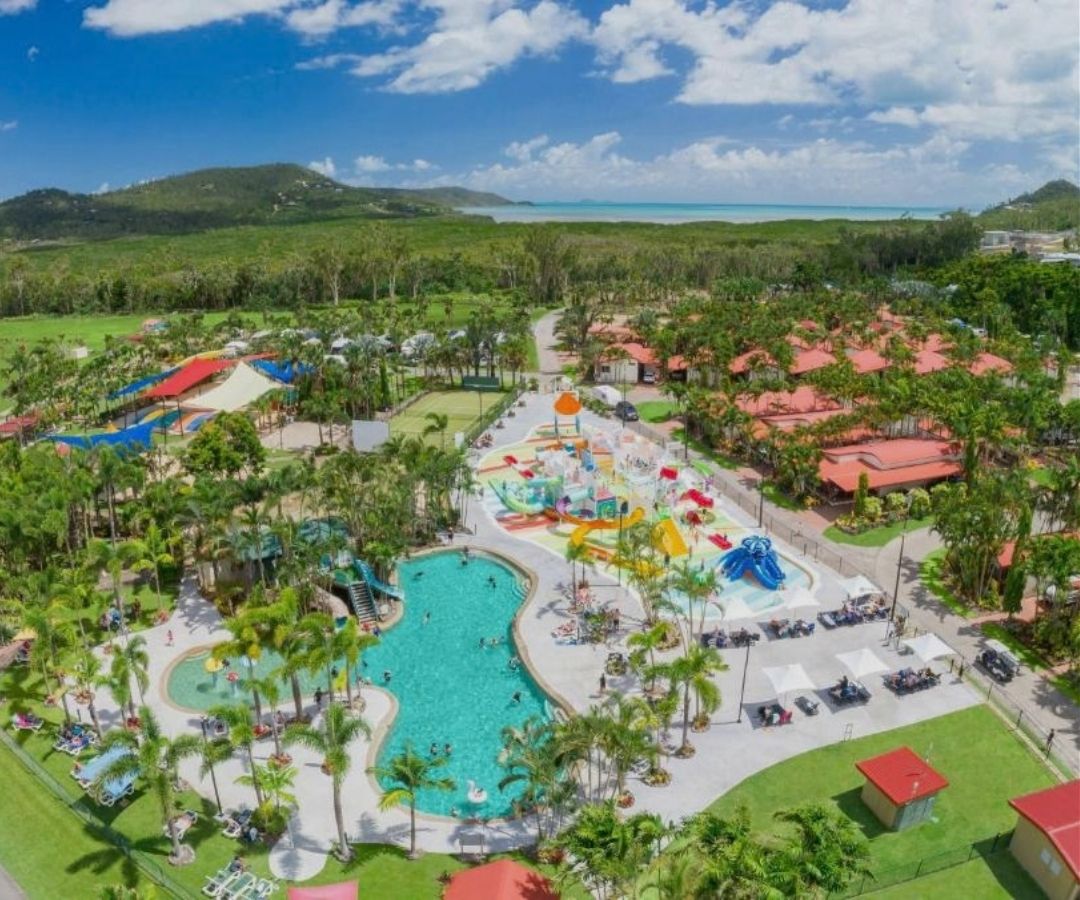 Aerial view of hotel with pool