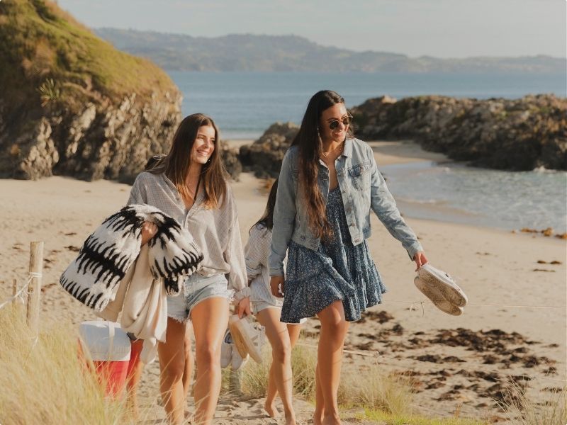 friends on auckland beach