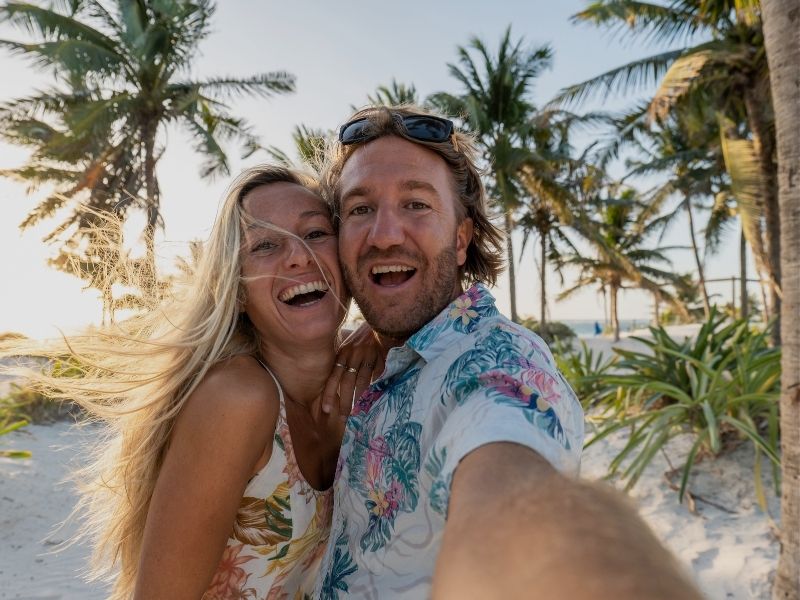 couple smiling on the beach