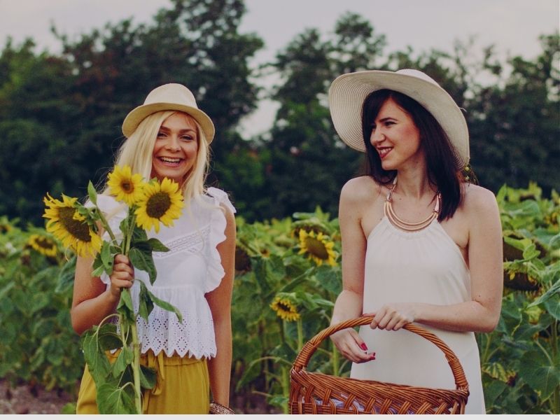 friends in sunflower field