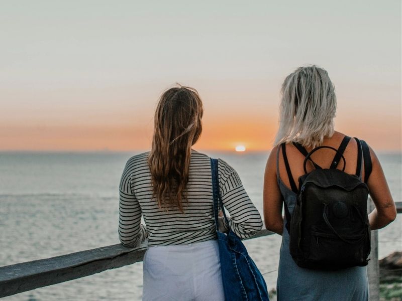 friends overlooking beach