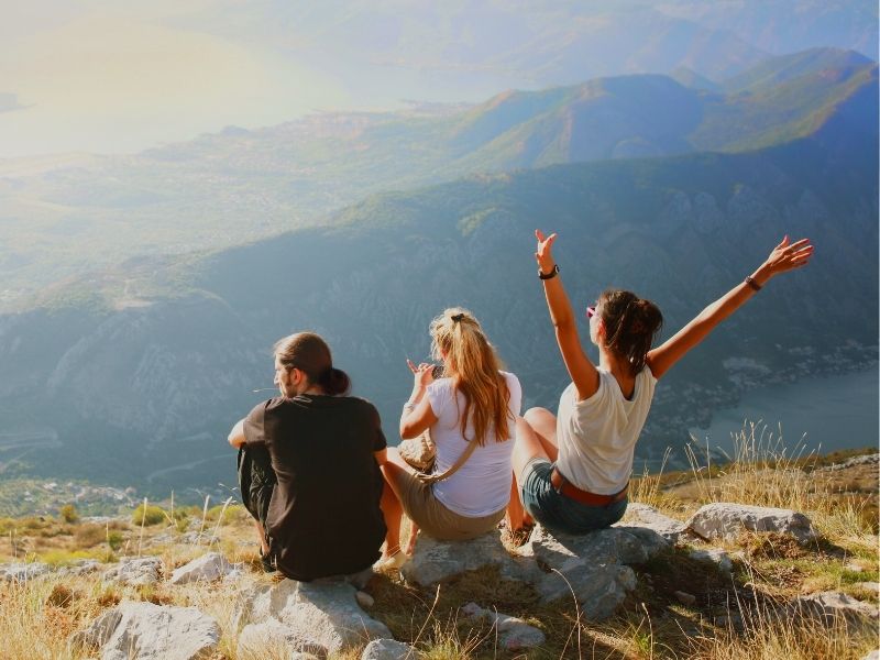 friends at the top of a mountain