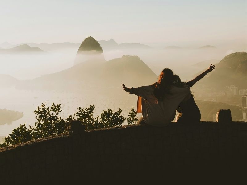 couple in misty mountains