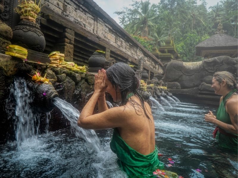 women in flowing water