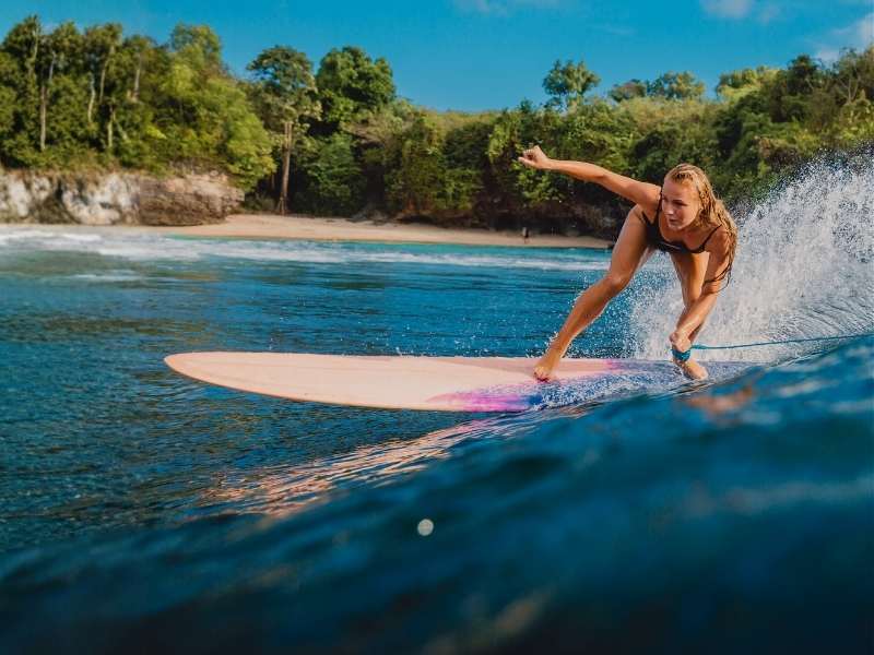 women surfing