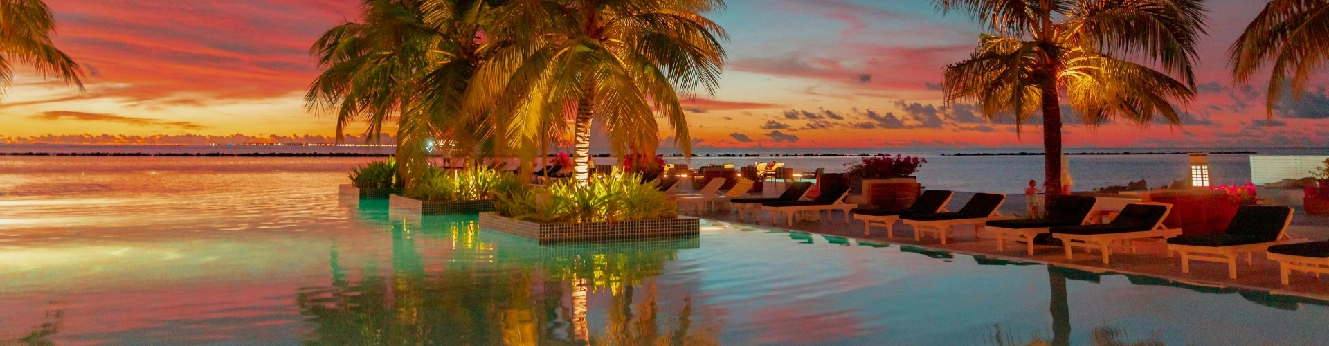Hotel pool at sunset