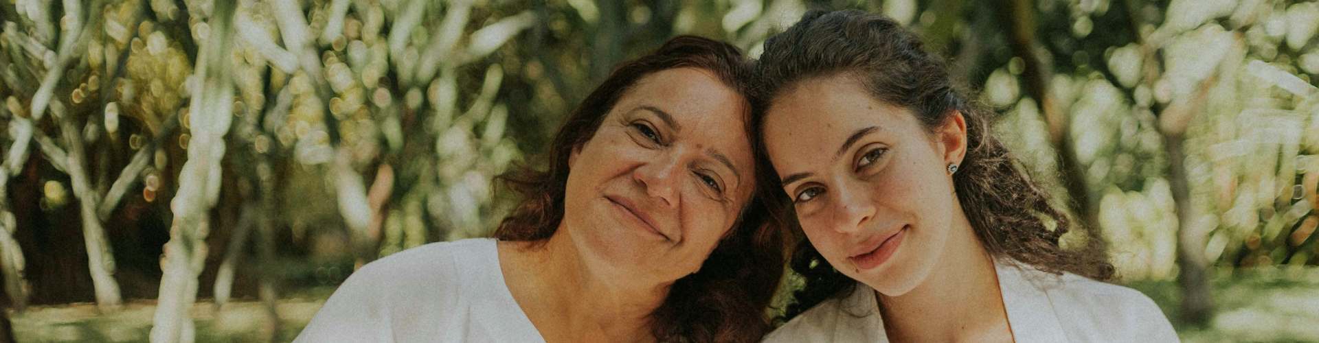 mother and daughter smiling
